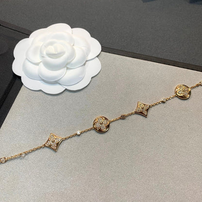 [Garvey ]STAR AND SUN 4 MOTIFS GOLD DIAMONDS BRACELET