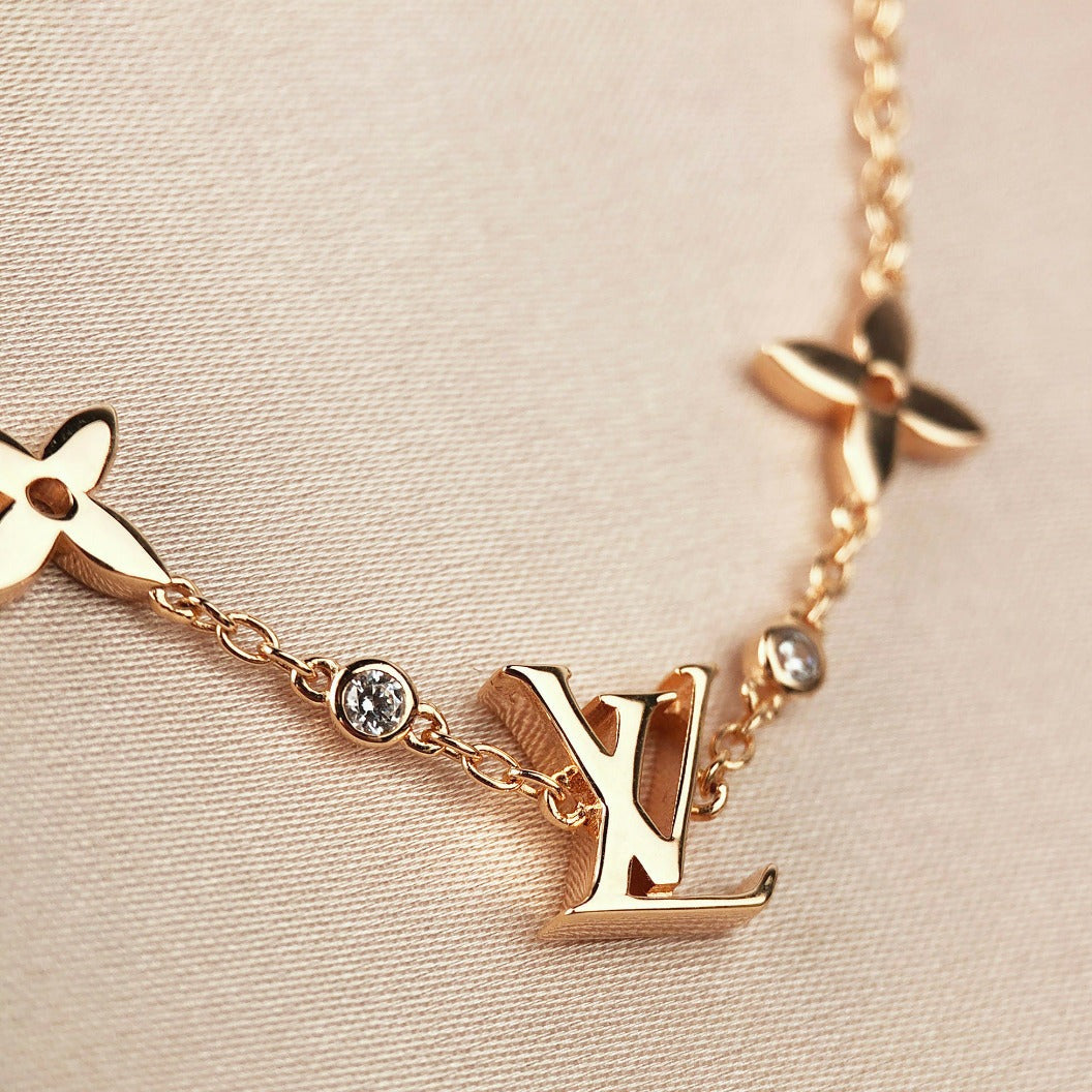 [Garvey ]STAR AND SUN 7 MOTIFS GOLD BRACELET