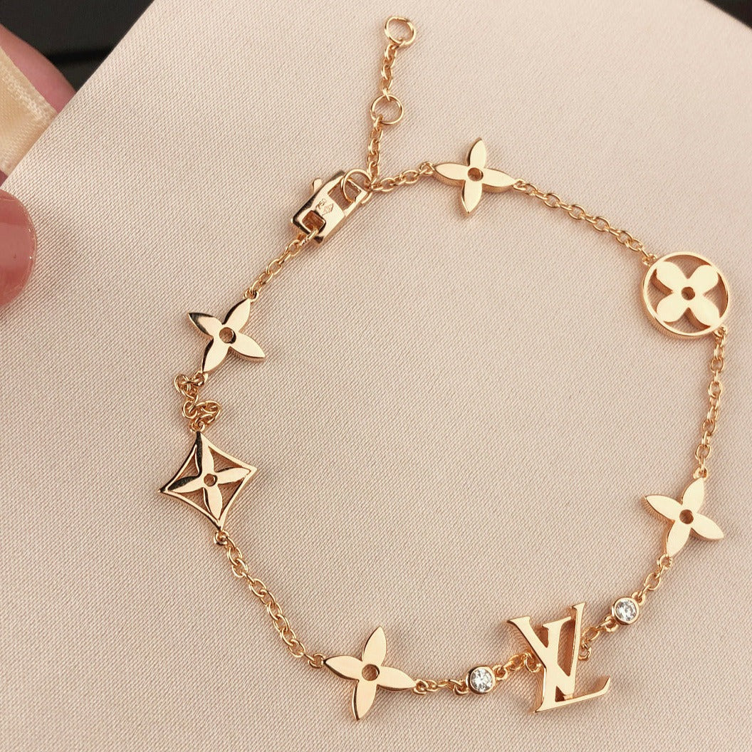 [Garvey]STAR AND SUN 7 MOTIFS GOLD BRACELET