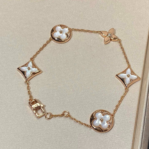 [Garvey ]STAR AND SUN 5 MOTIF MOP PINK GOLD BRACELET