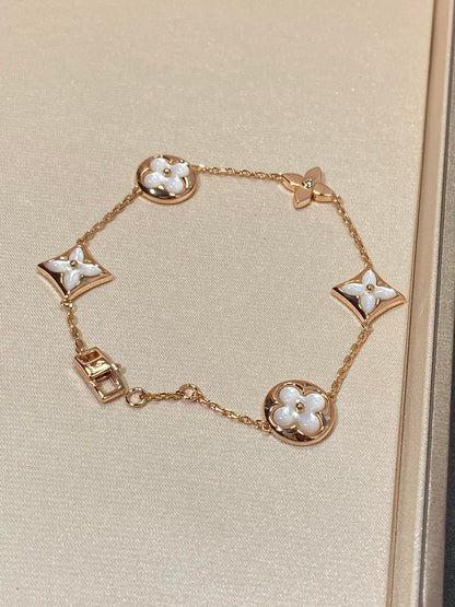 [Garvey ]STAR AND SUN 5 MOTIF MOP PINK GOLD BRACELET