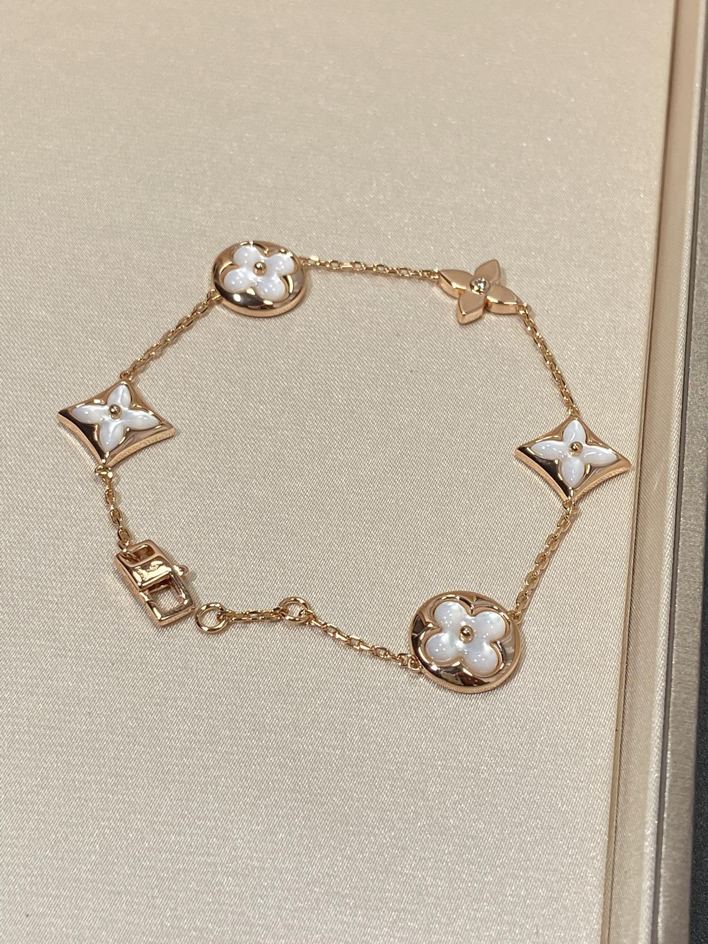 [Garvey]STAR AND SUN 5 MOTIF MOP ROSE GOLD BRACELET