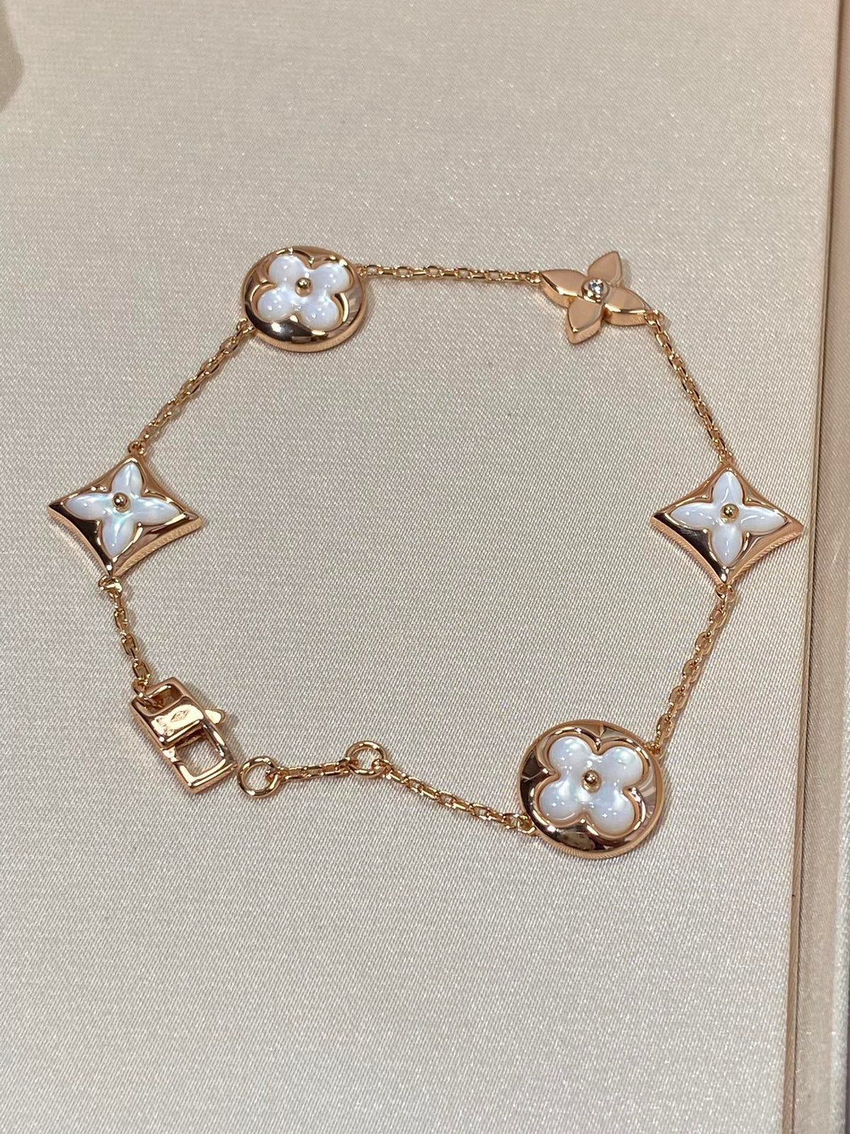 [Garvey ]STAR AND SUN 5 MOTIF MOP PINK GOLD BRACELET