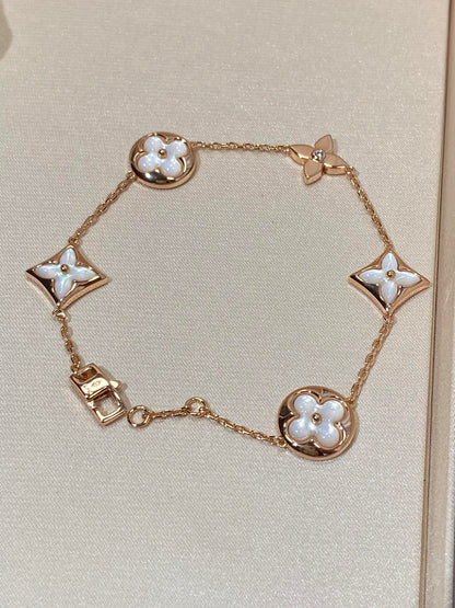 [Garvey ]STAR AND SUN 5 MOTIF MOP PINK GOLD BRACELET