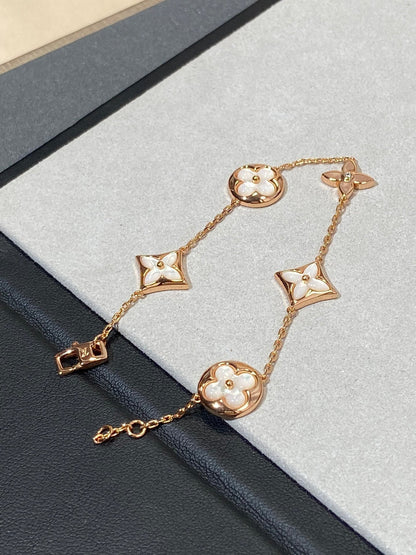 [Garvey ]STAR AND SUN 5 MOTIF MOP PINK GOLD BRACELET