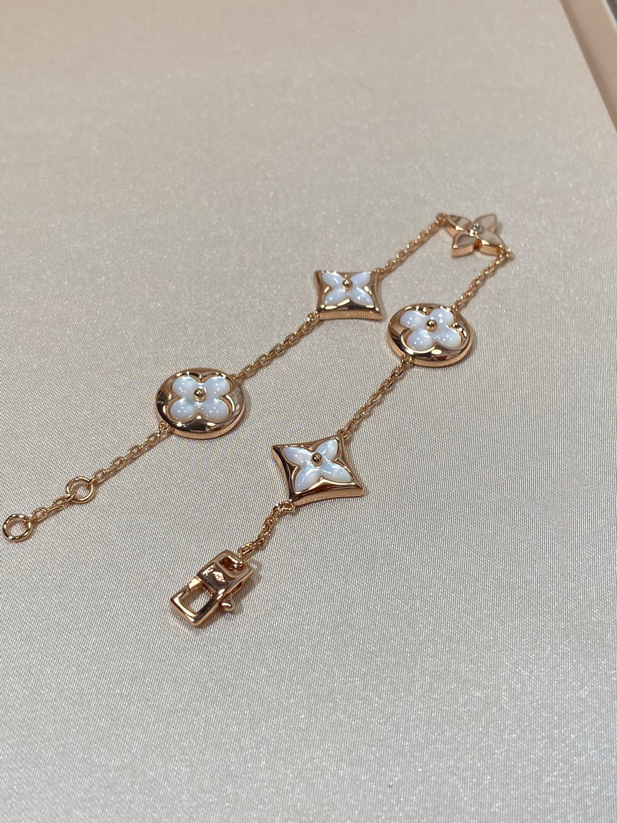[Garvey ]STAR AND SUN 5 MOTIF MOP PINK GOLD BRACELET