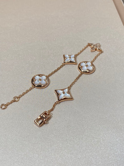 [Garvey ]STAR AND SUN 5 MOTIF MOP PINK GOLD BRACELET