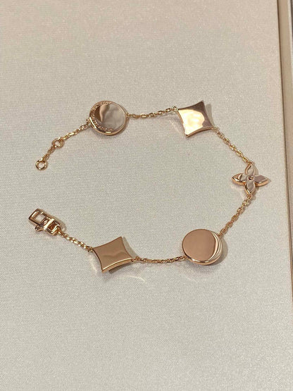 [Garvey ]STAR AND SUN 5 MOTIF MOP PINK GOLD BRACELET
