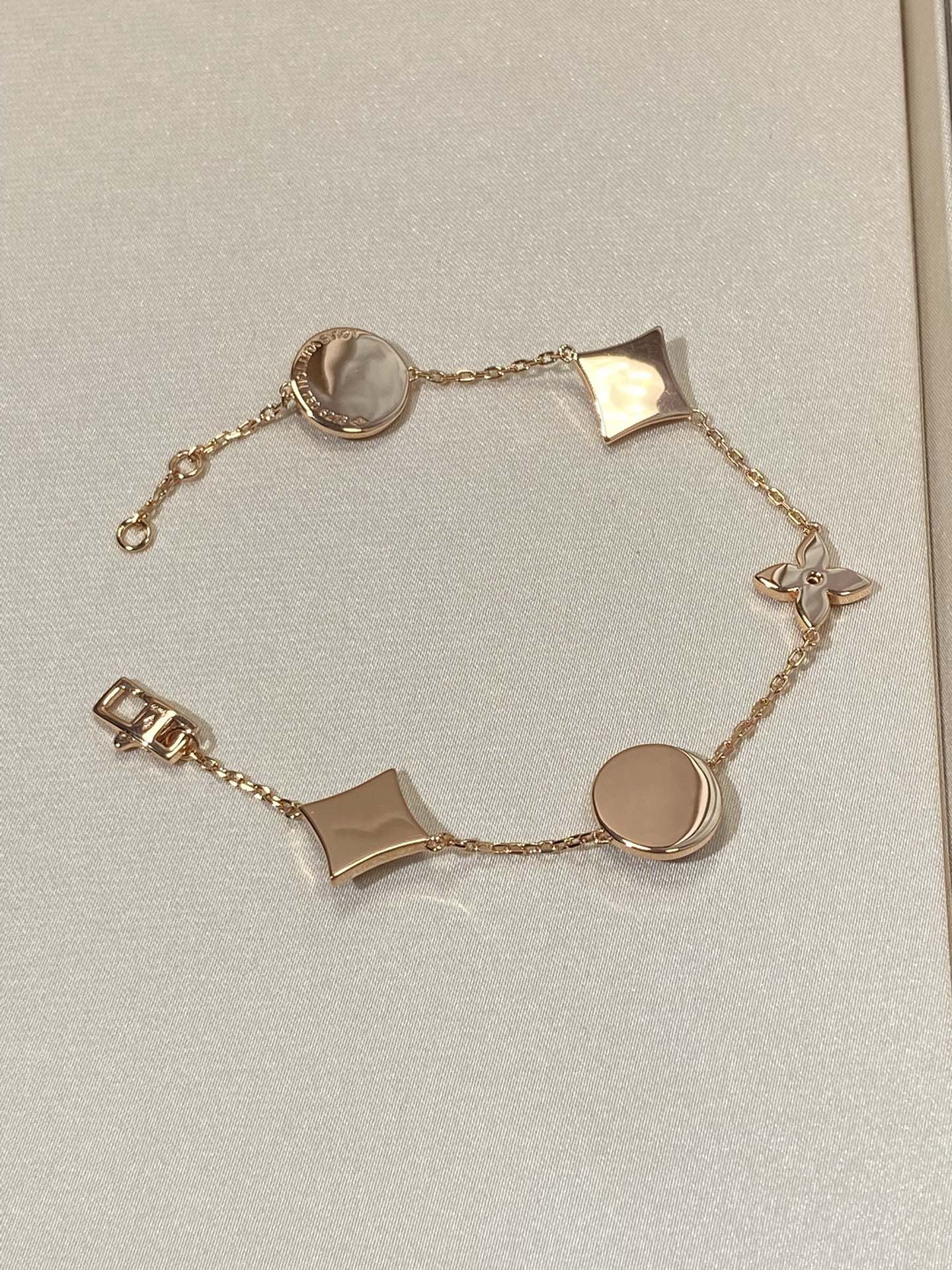 [Garvey]STAR AND SUN 5 MOTIF MOP ROSE GOLD BRACELET