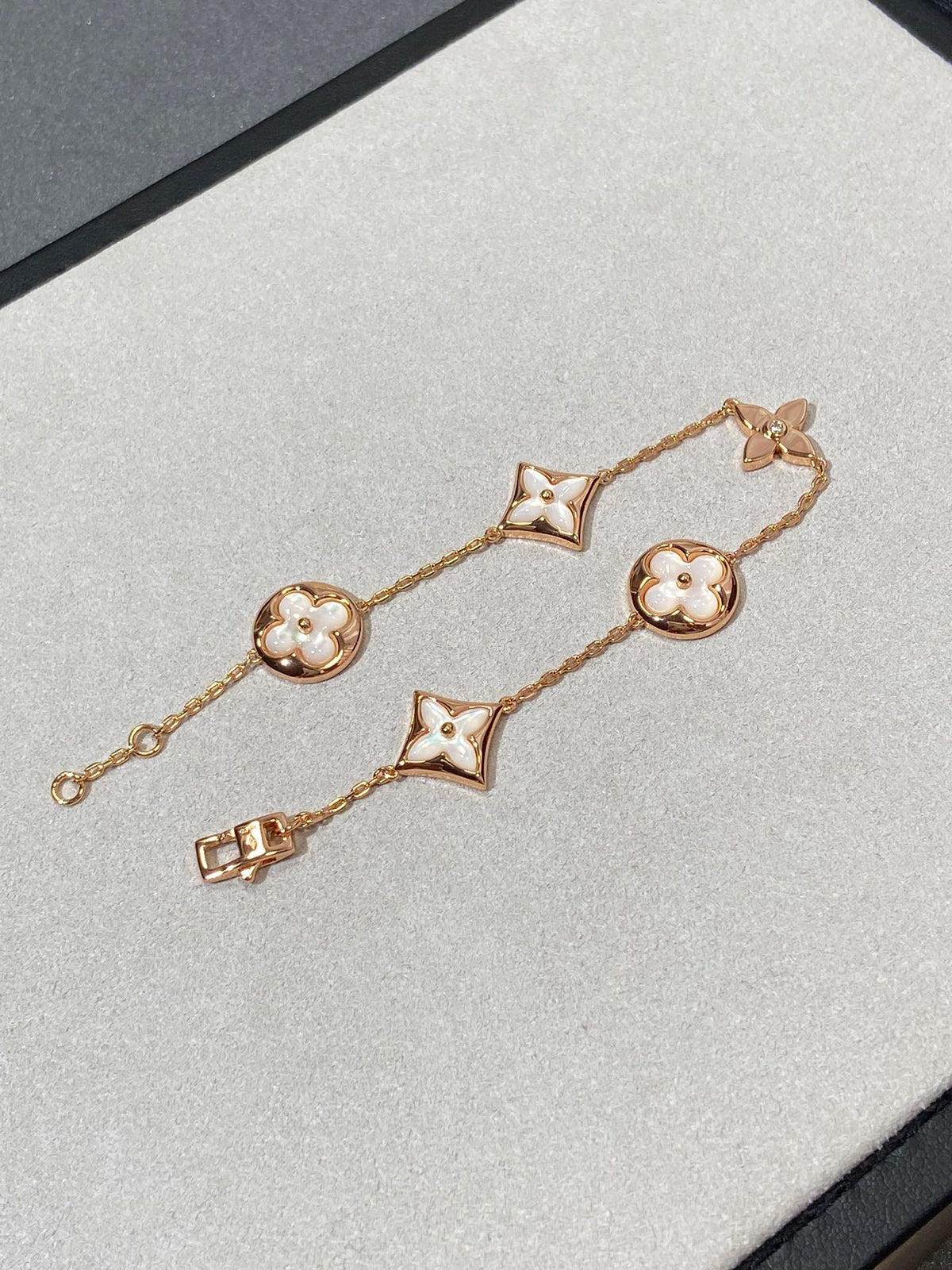 [Garvey ]STAR AND SUN 5 MOTIF MOP PINK GOLD BRACELET