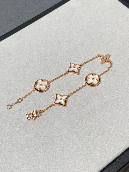 [Garvey ]STAR AND SUN 5 MOTIF MOP PINK GOLD BRACELET
