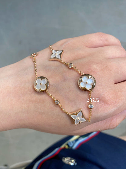 [Garvey ]STAR AND SUN 4 MOTIF WHITE MOP PINK GOLD BRACELET