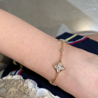 [Garvey ]STAR AND SUN 4 MOTIF WHITE MOP PINK GOLD BRACELET