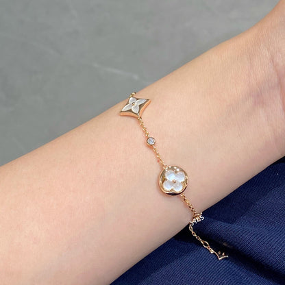 [Garvey ]STAR AND SUN 4 MOTIF WHITE MOP PINK GOLD BRACELET