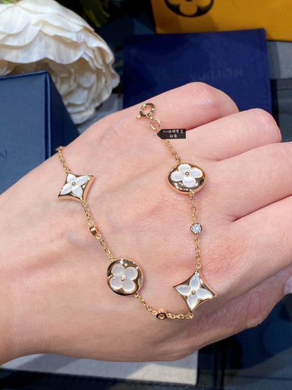 [Garvey ]STAR AND SUN 4 MOTIF WHITE MOP PINK GOLD BRACELET