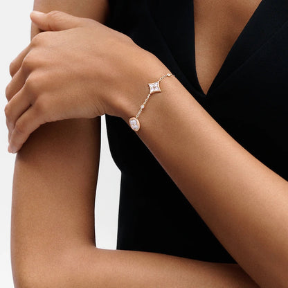 [Garvey ]STAR AND SUN 4 MOTIF WHITE MOP PINK GOLD BRACELET
