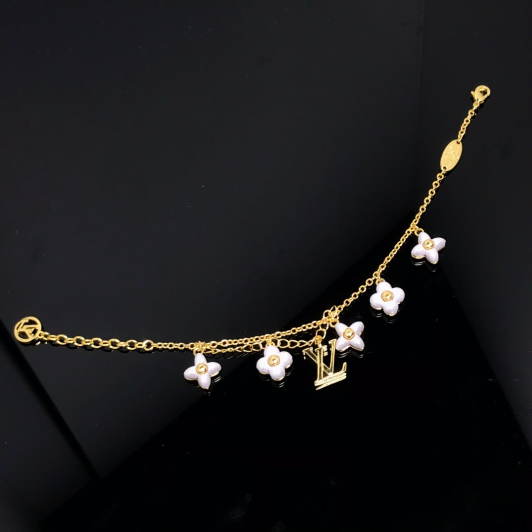 [Garvey ]LOGO 6 MOTIF STAR AND SUN GOLD BRACELET