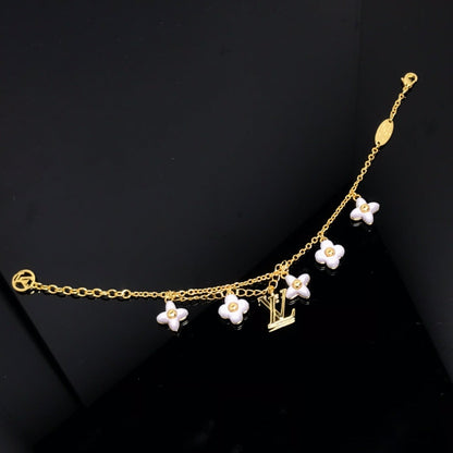 [Garvey ]LOGO 6 MOTIF STAR AND SUN GOLD BRACELET