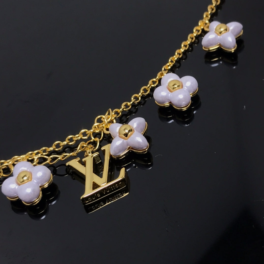 [Garvey ]LOGO 6 MOTIF STAR AND SUN GOLD BRACELET
