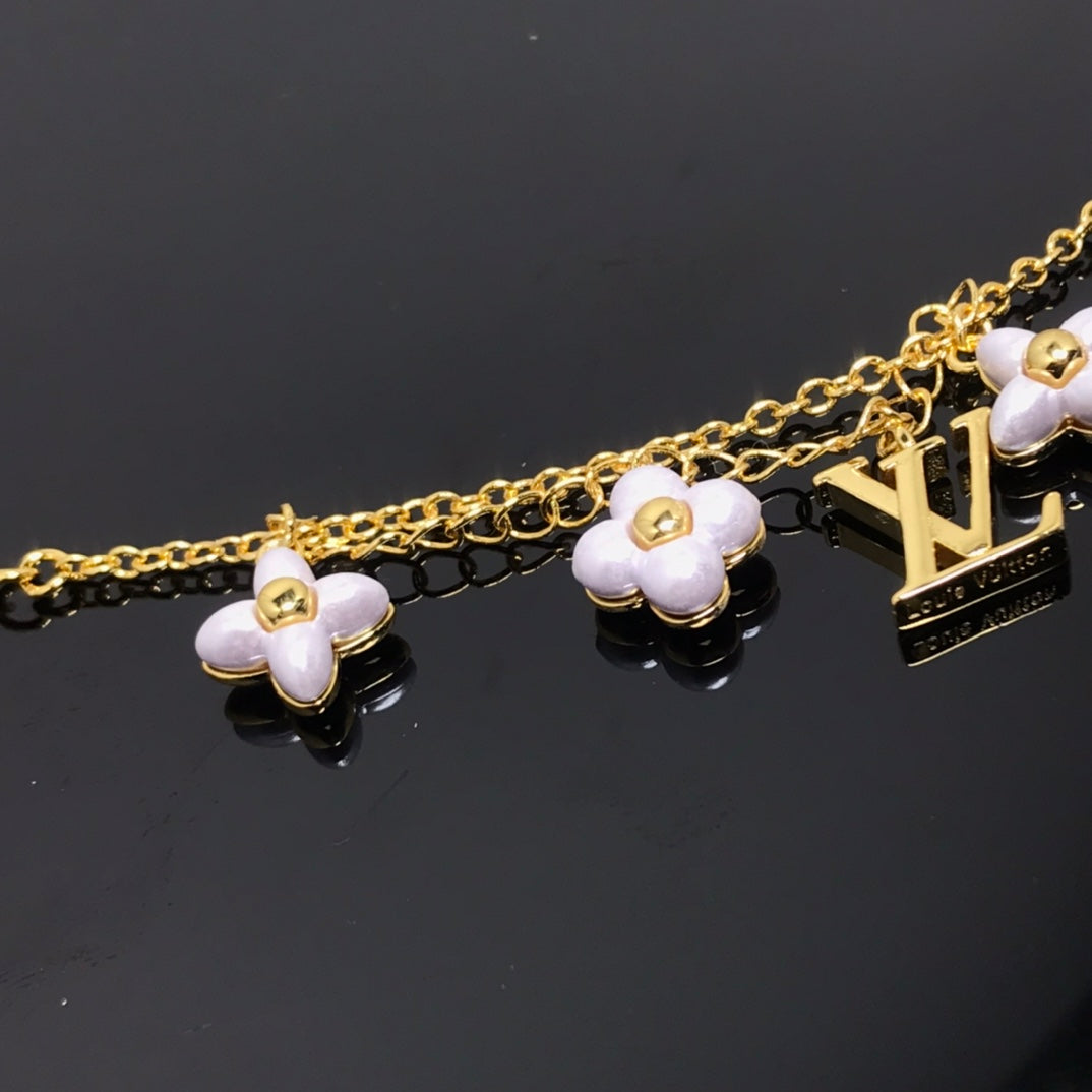 [Garvey ]LOGO 6 MOTIF STAR AND SUN GOLD BRACELET