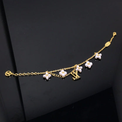 [Garvey ]LOGO 6 MOTIF STAR AND SUN GOLD BRACELET