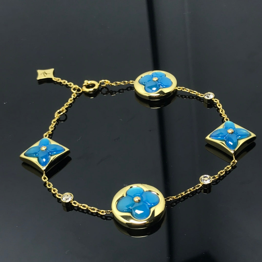 [Garvey]STAR AND SUN 4 MOTIF BLUE BRACELET