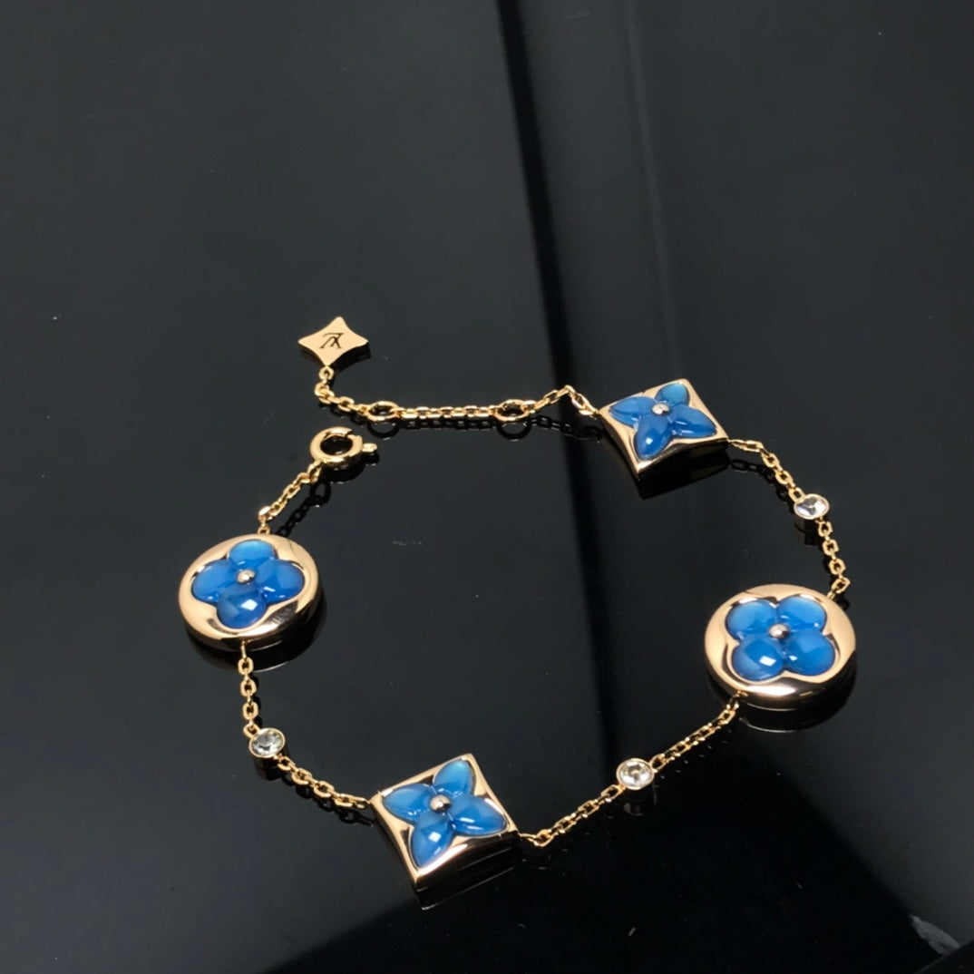[Garvey ]STAR AND SUN 4 MOTIF BLUE BRACELET